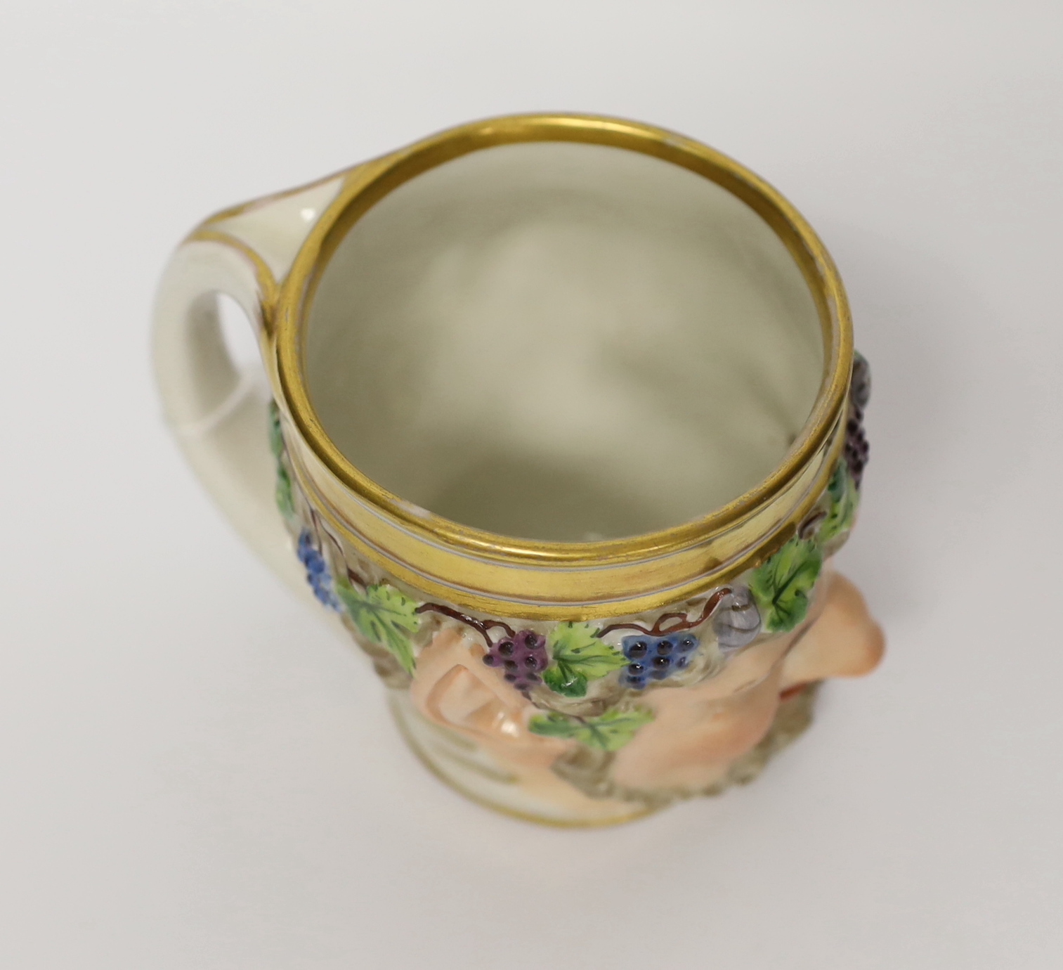 An early 19th century Vienna satyr mug, date code for 1827, 10cm